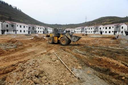 2010年农村占用耕地建房该怎么处理